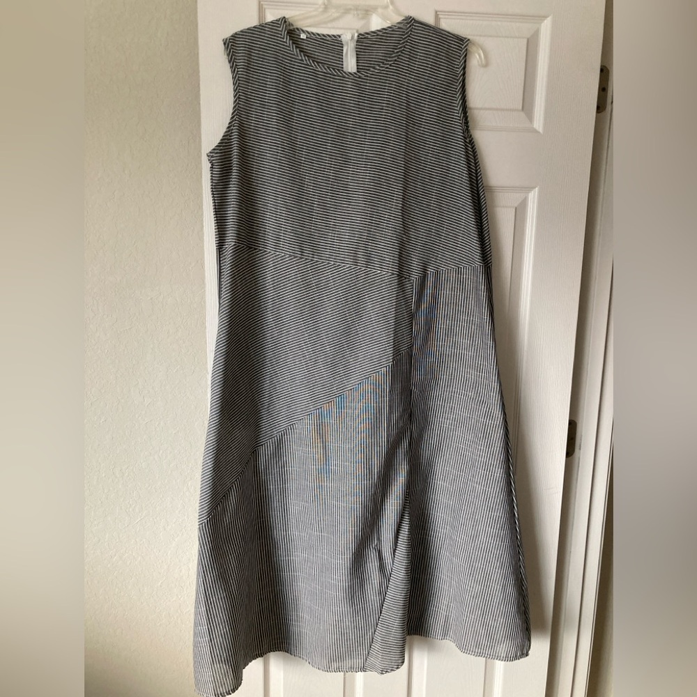 Black & white striped sleeveless A-Line dress with round neck line
